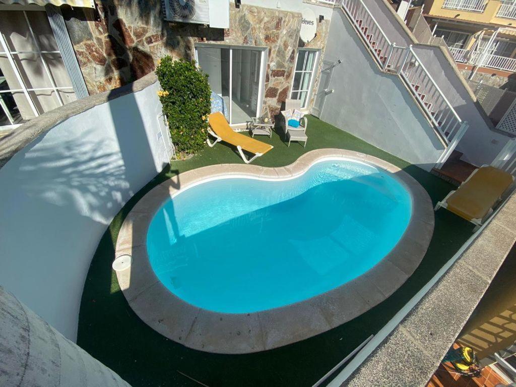 Апартаменты Apartamento Con Piscina Моган Экстерьер фото